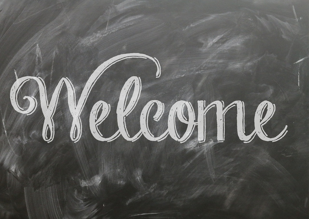 "Welcome" written on a chalkboard