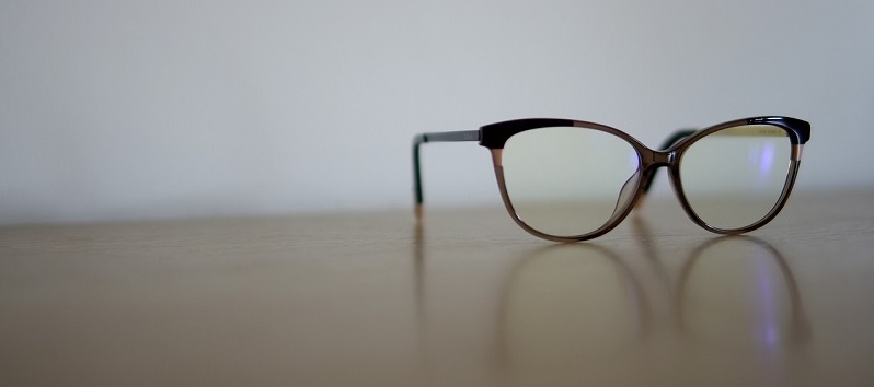 eye glasses sitting on a table