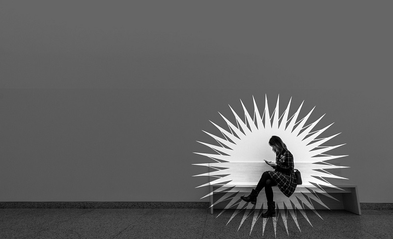 woman concentrating on her phone