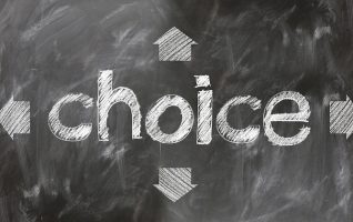 The word "choice" written on a blackboard