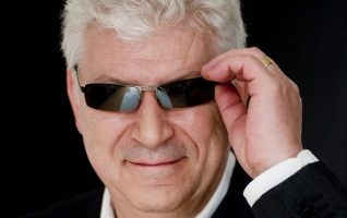 man with chic small sunglasses
