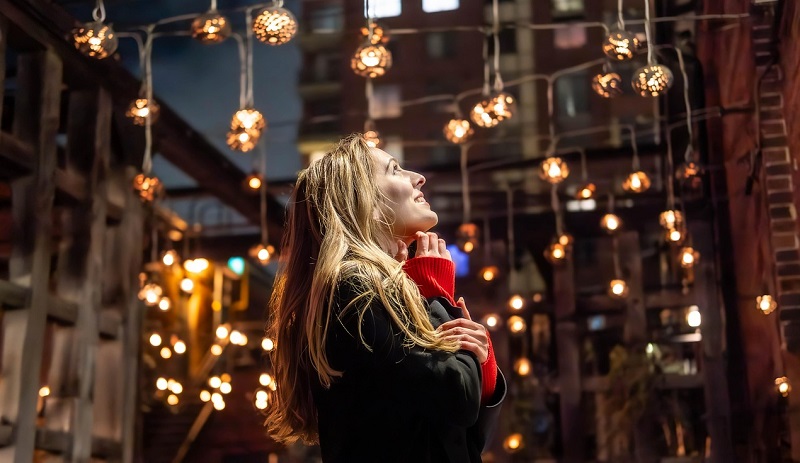 young woman making a wish