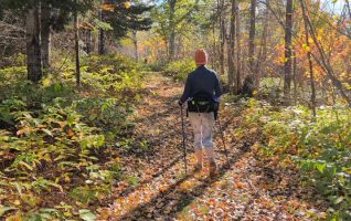the author hiking with poles